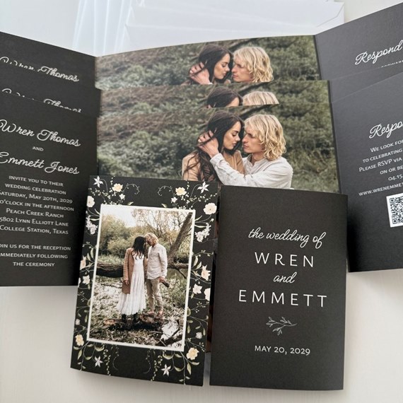 wedding invitation with floral border and photo area